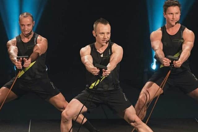 Justin Riley (centre) during one of the world-known Les Mills workouts.
