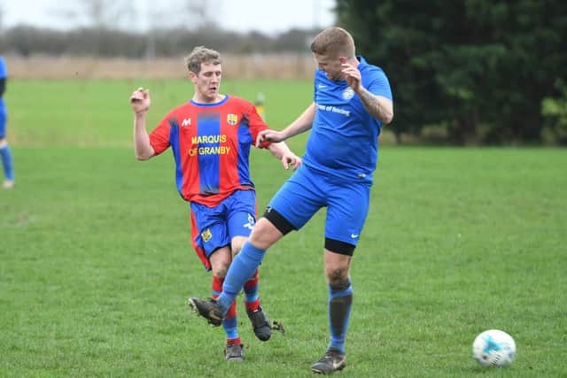 Fosdyke (blue) v Northgate Olympic (red). Gary Booth (blue), Dave Cook (red).