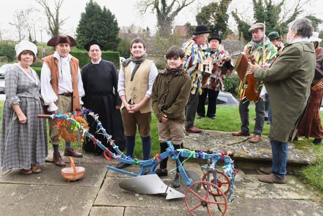 Plough Sunday event at Aslackby Parish Church. L-R Denise Gudgin, Chris Gudgin, Rev Father Rob Varty, Ben Clayton 13 and Matthew Clayton 11. EMN-190114-105640001