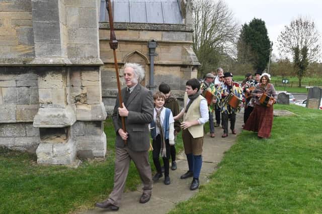 Plough Sunday event at Aslackby Parish Church. Plough procession into church. EMN-190114-105728001