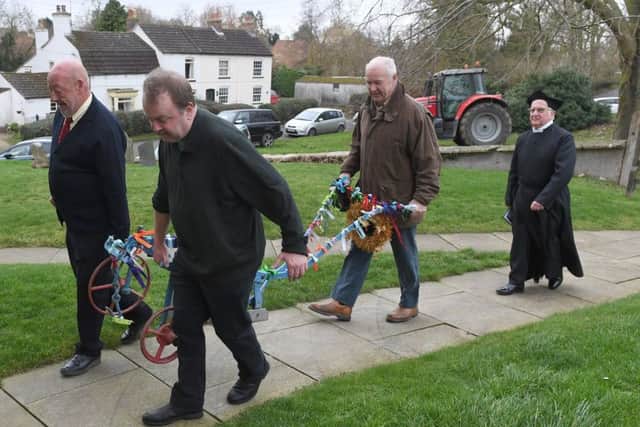 Plough Sunday event at Aslackby Parish Church. Plough procession into church. EMN-190114-105754001