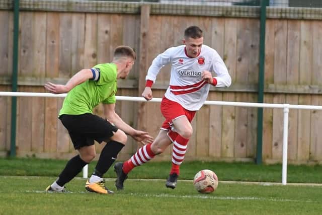 Skegness Town football action. James Wroot
