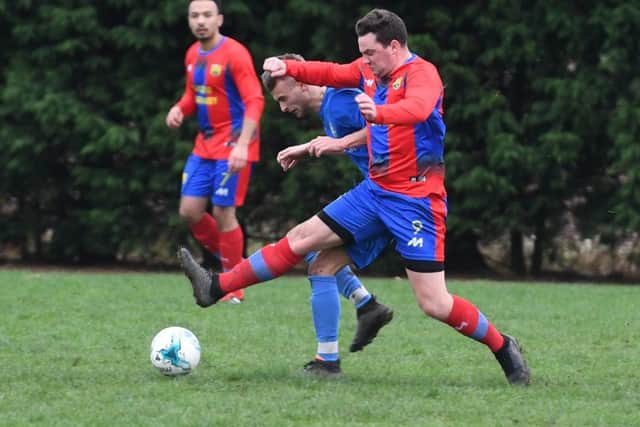 Liam Kishere puts in a challenge on Fosdyke's Jake Holland EMN-190114-155003002