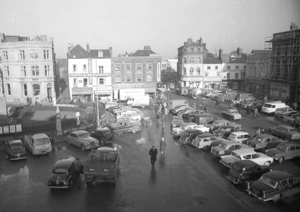 In the distance of this photograph from early 1962 Marks and Spencer can be seen before its expansion in the autum of that year. Its neighbour, the New Theatre, is set for demolition.