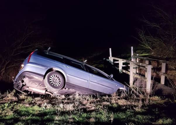 A car ended up in a ditch and a man was arrested by police.