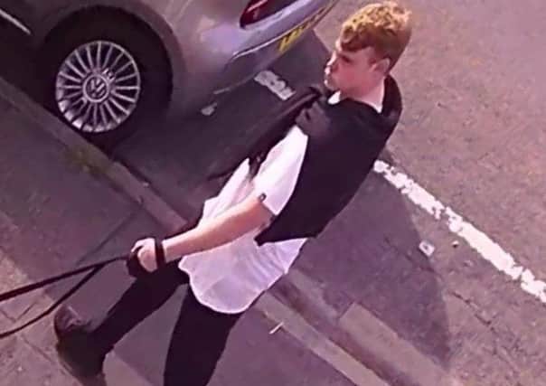 One of the men police would like to talk to is described as having ginger/blonde short hair, and wearing a white t-shirt and black trousers. ANL-190116-143431001