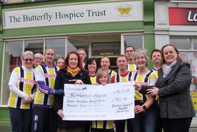 Community Runners members Carmen Clark, Nicola Housam, Rachel Conway, John Burton, Dawn Skinner, Dan Clark, Nathan Saw, Jon Carpenter and Christopher Chevis were able to join Tanya and Harrison Knight and Sarah Burton at the presentation outside the Trusts shop in the Market Place.