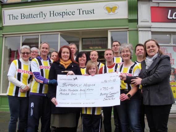 Community Runners members Carmen Clark, Nicola Housam, Rachel Conway, John Burton, Dawn Skinner, Dan Clark, Nathan Saw, Jon Carpenter and Christopher Chevis were able to join Tanya and Harrison Knight and Sarah Burton at the presentation outside the Trusts shop in the Market Place.