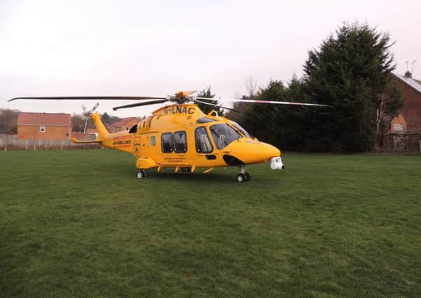 The Lincs and Notts Air Ambulance landed in George Street playing field to allow its medics to attend a medical emergency in Sleaford. EMN-190118-120900001