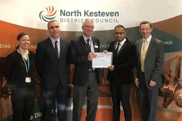 Pictured from left - Rachel Belcher, Locality Lead (North and South Kesteven) for Public Health Lincolnshire, Mark Stuart, Public Protection Manager for North Kesteven District Council, Coun Peter Burley, Executive Board member for North Kesteven District Council, Muhammed Karim, Business Development Manager at The Agra and David Steels, Head of Environment and Public Protection for North Kesteven District Council. EMN-190118-152822001