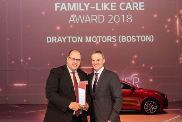 Drayton Motors Kias Darren Bradford (left), with Simon Hetherington, commerical director at Kia Motors (UK).