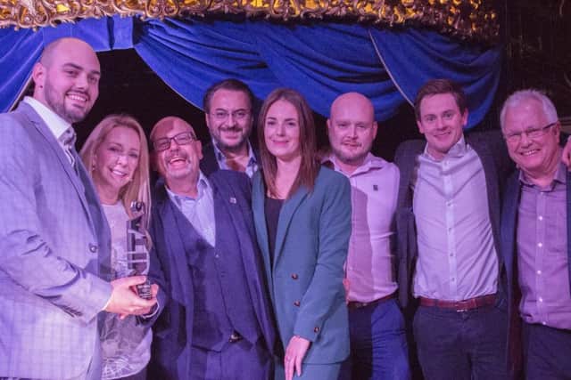 Some of the team from the Coaching Inn Group collecting their award.