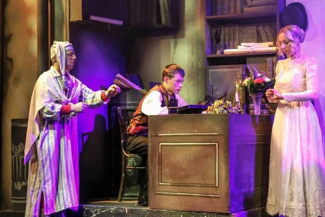 Scrooge performed by Skegness Musical Theatre Company. ANL-190118-153145001