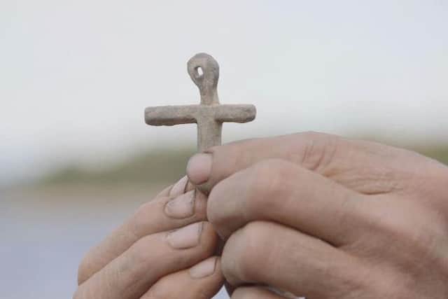 The mysterious lead cross, believed to be Knights Templar in origin, was found on Oak Island by Gary Drayton.