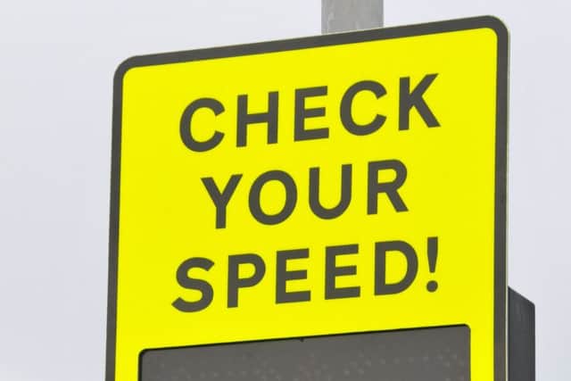 Community Speed Watch sign.