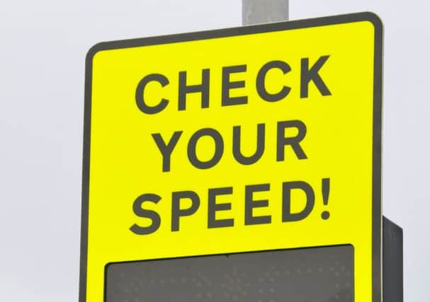 Community Speed Watch sign.