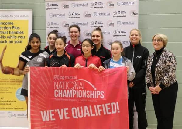 Darcie, third from right, is pictured with some of her fellow qualifiers and Sandra Deaton, Chair of Table Tennis England.