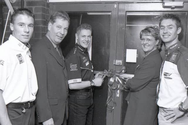 Superbike's James Haydon, Chris Walker, and James Toseland, at the official opening of the new Boston showroom in 1999 with Richard and Shirley Wilson.