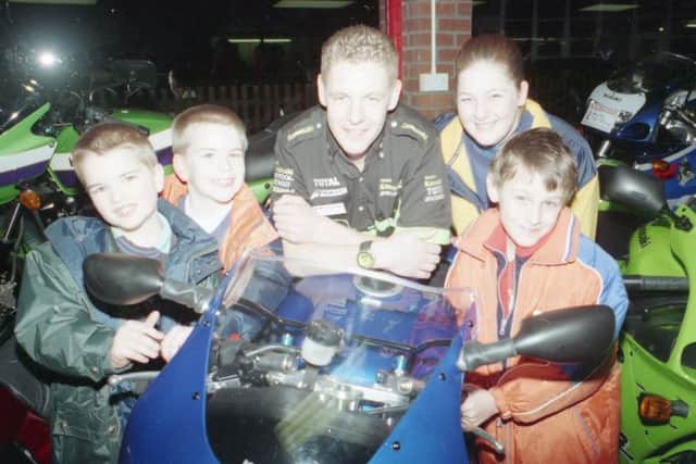 Team Kawasaki's Chris Walker with fans in 1999.