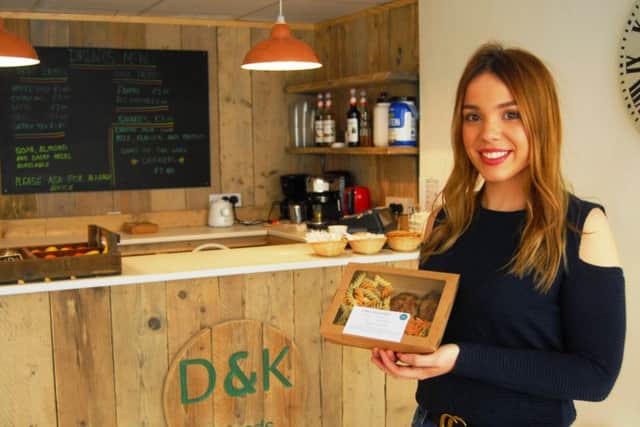 Kim Saddey with one of the healthy meal boxes created by her sister Dominique for their blossoming business, D and K Fit Foods, that has just opened in Sleaford. EMN-190124-181201001