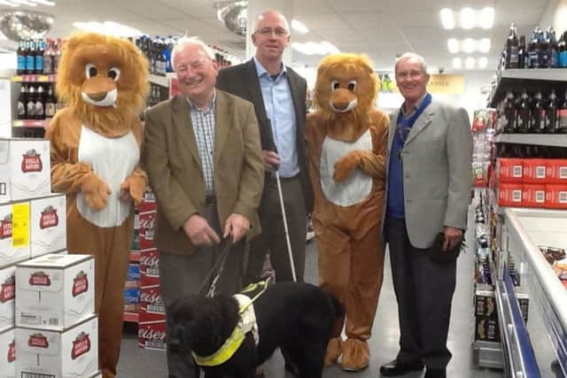 The Lions took ELDC leader Craig leyland out shopping - and he was blindfolded to help raise awareness of World Sight Day.