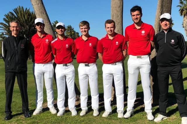 Sam Done (middle) with England team-mates and coaches in Spain EMN-190128-125457002