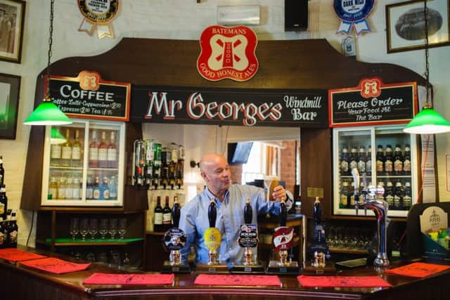 Stuart Bateman celebrating in Mr George's Windmill Bar. ANL-190131-124915001