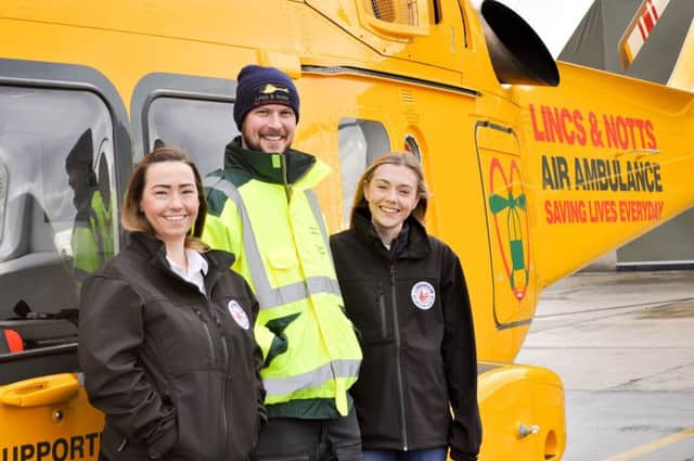 L J Fairburn & Son representatives, Lynette Fleeting and Tabby Ward, alongside Ambucopters Pilot Patrick Lidstone.