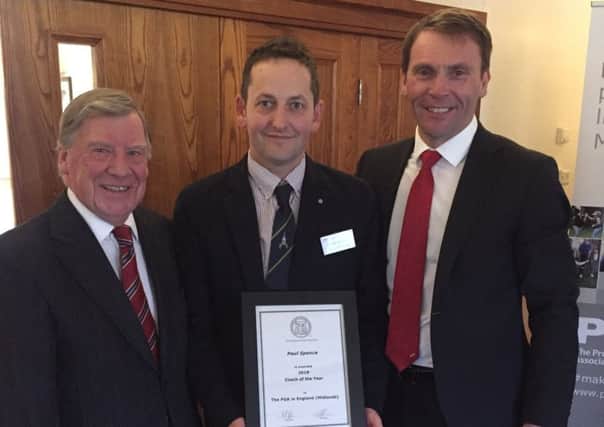 Paul (centre) collects his Midlands PGA award from Robert Maxfield, chief executive of the PGA, and his mentor Eric Sharp EMN-190131-114745002