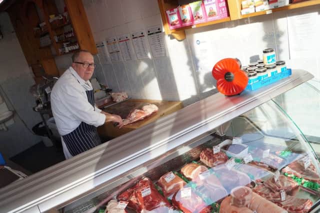 Butcher Kevin Dixon busy at Mellors Butchers