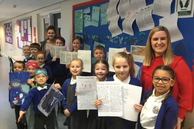pupils of Friskney All Saints (C of E) Primary School launch their campaign agaignst the use of pleastic. Miss Lauren Goodwin (Year 3/ 4 teacher) is pictured leftand Miss Emma Taylor (Head Teacher) , right. ANL-190402-103045001