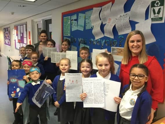 pupils of Friskney All Saints (C of E) Primary School launch their campaign agaignst the use of pleastic. Miss Lauren Goodwin (Year 3/ 4 teacher) is pictured leftand Miss Emma Taylor (Head Teacher) ,  right. ANL-190402-103045001