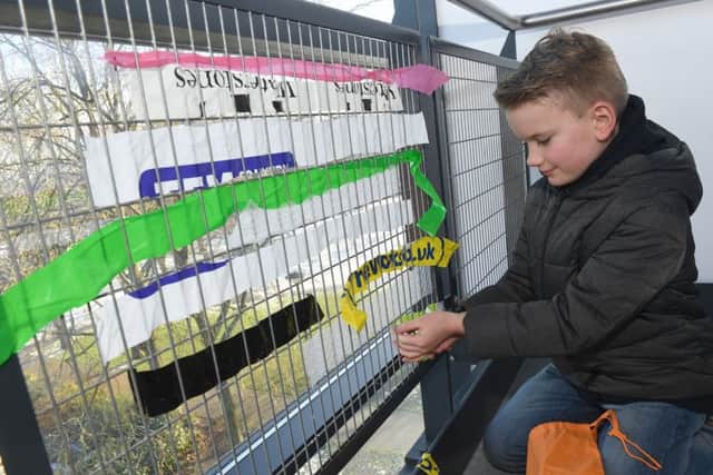 Big Community Weave at National Centre for Craft and Design. Gabriel Sinnott 13 of Billinghay, weaving. EMN-190402-143403001