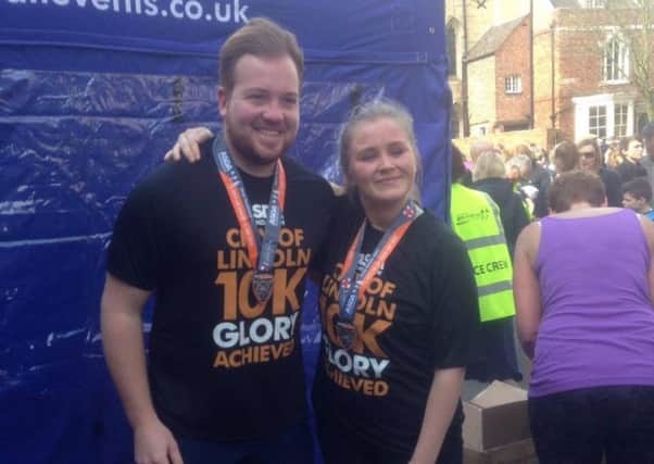 Jessica Lowe with her friend, Ben Crampton, at the Lincoln 10K three years ago.