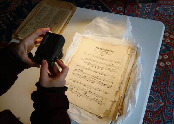 Pouring over Gunby Hall's musical heritage. Picture: National Trust