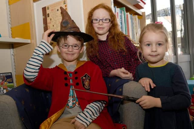 Harry Potter inspired activities at Sleaford Library. L-R Jenson White 7, Scarlett Michie 7, Florence White 4. EMN-191102-095640001