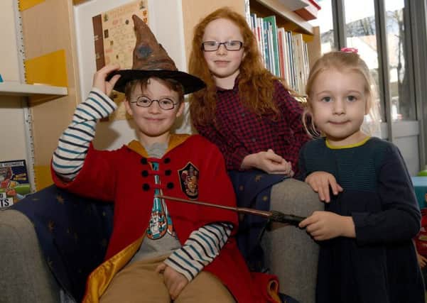 Harry Potter inspired activities at Sleaford Library. L-R Jenson White 7, Scarlett Michie 7, Florence White 4. EMN-191102-095640001