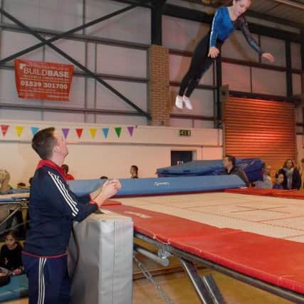 Big Jump Trampoline Club officially opened by olympic trampoline coach Paul Greaves pictured with Amy Patchett 13. EMN-191102-095756001