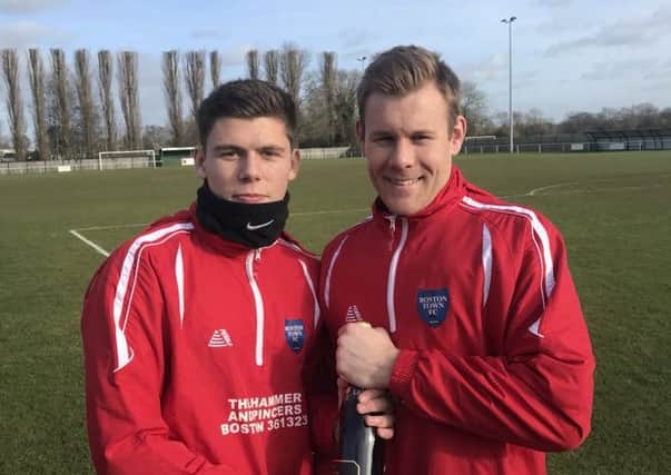 Ollie Pinner (right) with Town skipper Danny Horton.