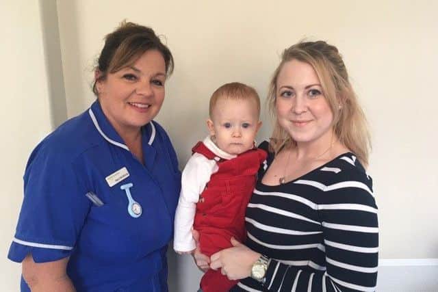 Quarrington midwife Mary McGillivray with Sophie Ransen and baby Noah. Image supplied.