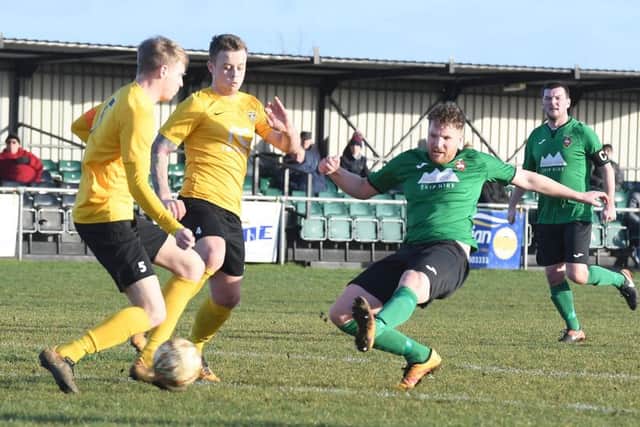 Tom Siddons fires in an effort on his return to Town colours against Harborough. Picture: David Dawson EMN-191102-163931002