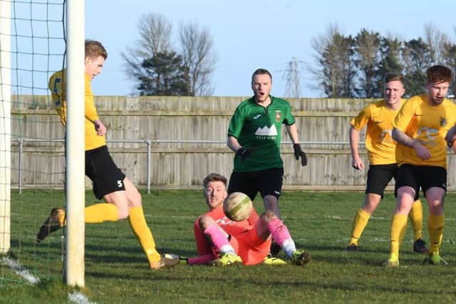 Harborough clear the danger as Scott Coupland lurks Picture: David Dawson EMN-191102-163909002
