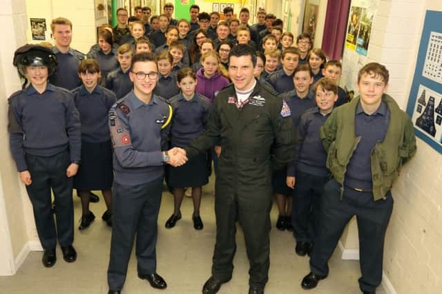 Flt Lt Jim Peterson is thanked for his visit to Sleaford ATC by Cadet Warrant Officer Sam Hurry - the most senior cadet in the unit. EMN-190215-161559001