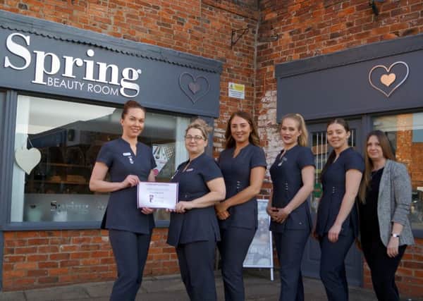 All smiles for staff at Spring Beauty Room after the salon has been shortlisted for two prestigious awards. EMN-190218-081018001