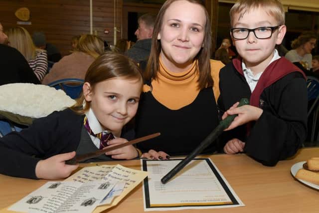 Harry Potter night at Horbling Brown's School. L-R Frankie Atkins 6, Sian Atkins, Mason Atkins 7. EMN-190802-095537001