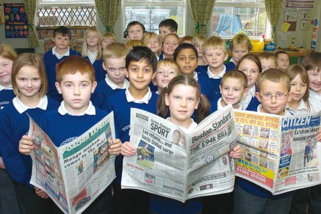 Read all about it! Some of the youngsters get to grips with the Boston Standard, the Poacher Express and The Citizen 10 years ago.