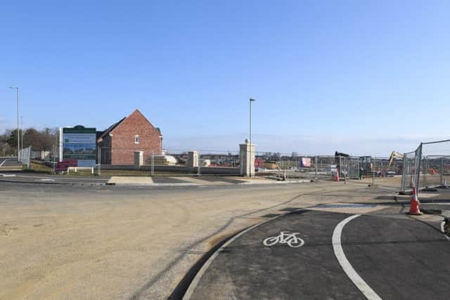 The new urban extension development to Sleaford underway at Handley Chase, London Road - NKDC is considering ways to use future contributions from developers to install local health facilities itself in future. EMN-190216-144054001