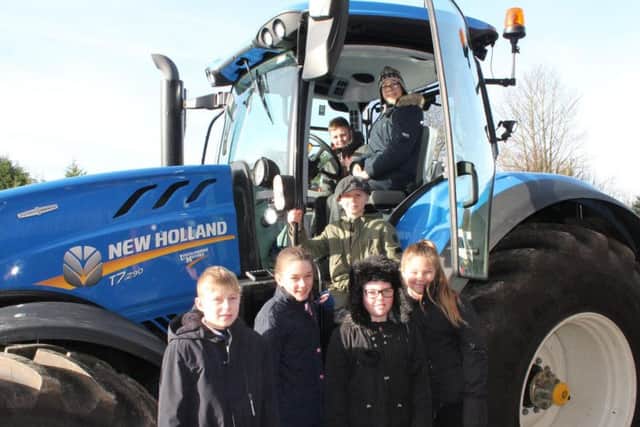 Pupils took the opportunity to climb aboard a tractor, kindly provided by Lincolnshire Motors.