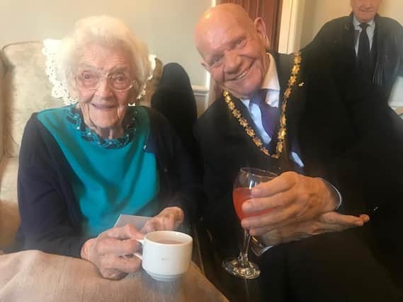 Gladys Waite celebrating her 107th birthday with the Mayor of Skegness Coun Sid Dennis.