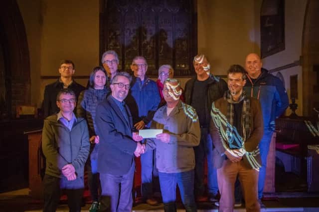 Spilsby Town Council present a cheque for £400 to the Spilsby Light Night organisers. Pictured are: Back row- Cllr Tom Kemp, Cllr Keziah Wood, Cllr David Mangion, Cllr Terry Taylor, Bonny Smith, Cllr Max Gibson, Cllr Lee Marsh. Front row- Andy Johnson-Smith, Simon Hollingworth, Cllr Mark Galeand Will Lindley. ANL-190218-174618001